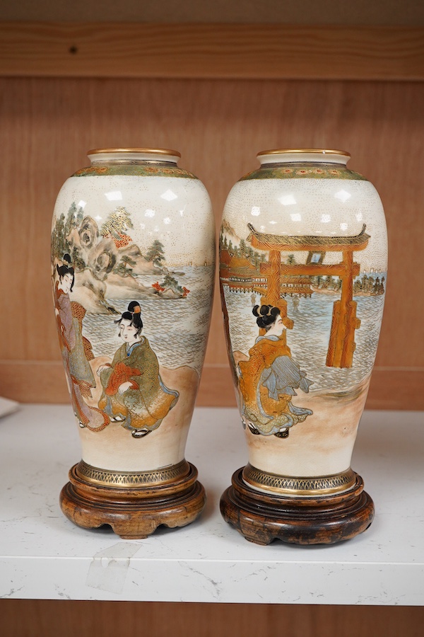 A pair of Japanese satsuma vases and stands, signed, Meiji period (1868-1912), 21cm total